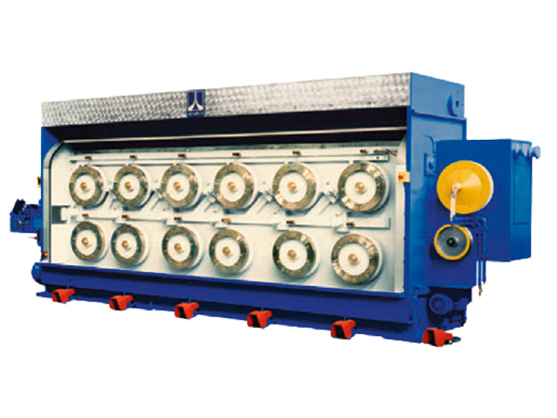 Henrich Walzdraht-Ziehmaschine S als Teil einer Grobzug-Ziehlinie mit Ziehrollen und Drahtzuführung für industrielle Drahtproduktion.